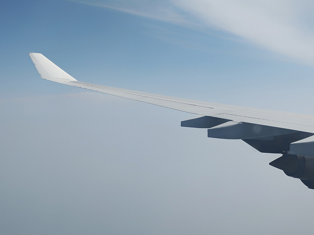 External view of plane wing in flight